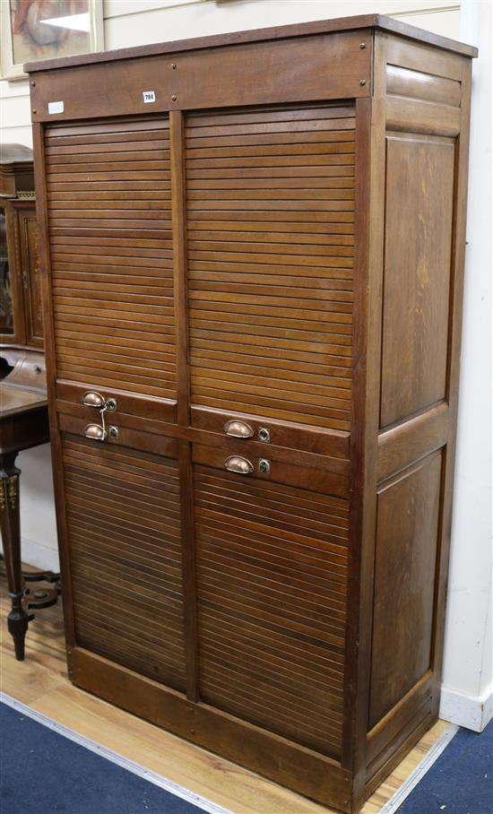 An oak tambour shutter filing cabinet W.97cm.